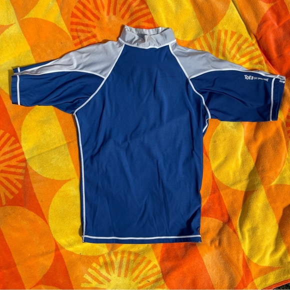 Toes on the Nose Rashguard - Picture 2 of 7